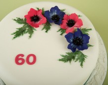 'Anemone Cake' - The flowers are made using our 'Large Christmas Rose' with leaves from our 'Large Daisy Set'. The '60' is from our 'Large Numerals' set. Set'  